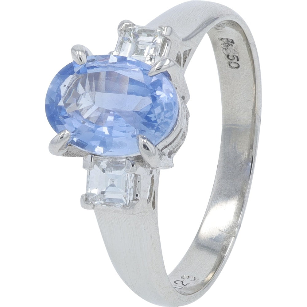 Platinum 1.36 Carat Oval Sapphire and 0.23 Carat Baguette Diamond Three-Stone Ring - Size 5.75