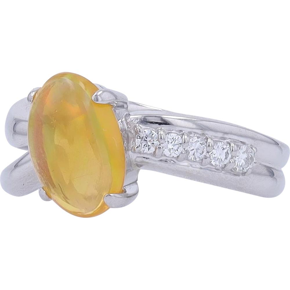 Platinum 1.40 Carat Oval Fire Opal Ring with 0.11 Carat Total Diamond Accents