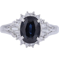 Platinum 1.43 Carat Oval Sapphire Ring with Diamond Halo and Baguette Accents - 0.28 Carat Total Diamond Weight