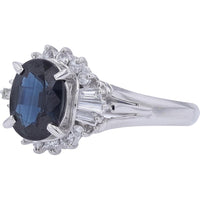 Platinum 1.43 Carat Oval Sapphire Ring with Diamond Halo and Baguette Accents - 0.28 Carat Total Diamond Weight