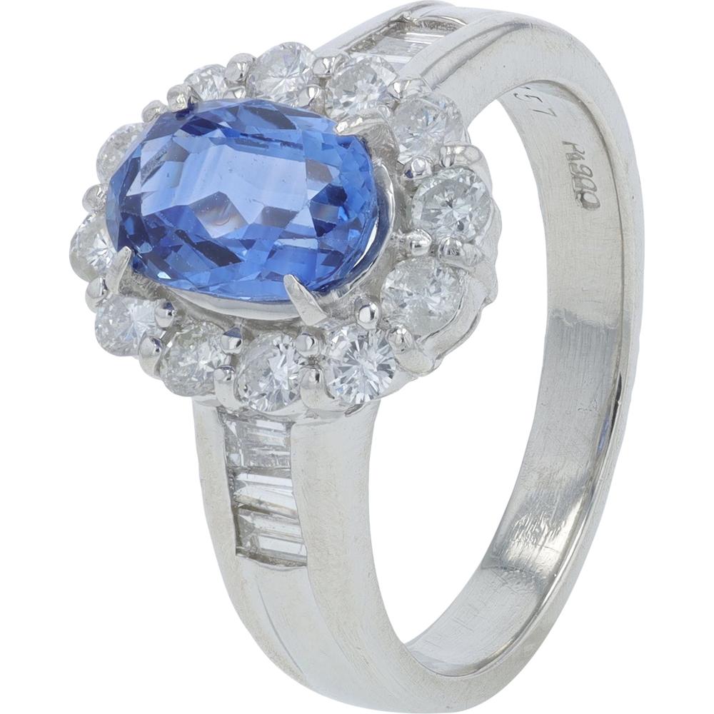Platinum 1.57 Carat Oval Sapphire Ring with 0.74 Carat Diamond Halo and Baguette Accents
