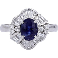 Platinum 1.653 Carat Oval Sapphire Ring with 0.58 Carat Baguette Diamond Halo