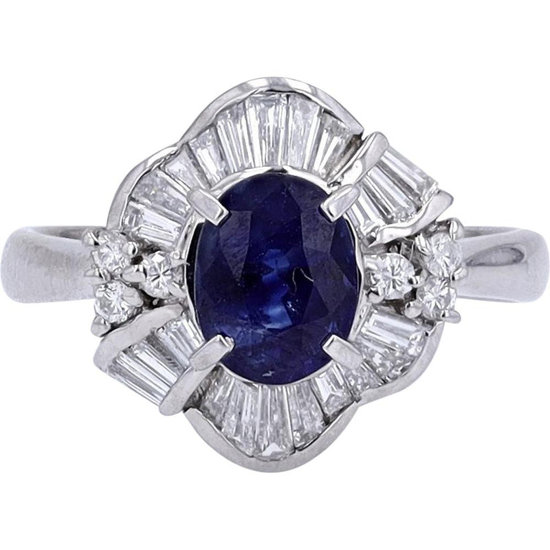 Platinum 1.653 Carat Oval Sapphire Ring with 0.58 Carat Baguette Diamond Halo