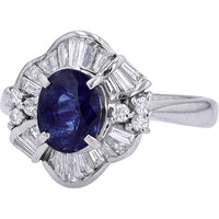 Platinum 1.653 Carat Oval Sapphire Ring with 0.58 Carat Baguette Diamond Halo