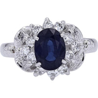 Platinum 1.81 Carat Oval Sapphire Ring with 0.30 Carats Diamond Halo