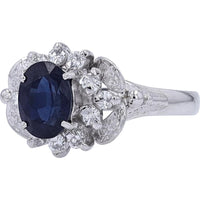Platinum 1.81 Carat Oval Sapphire Ring with 0.30 Carats Diamond Halo