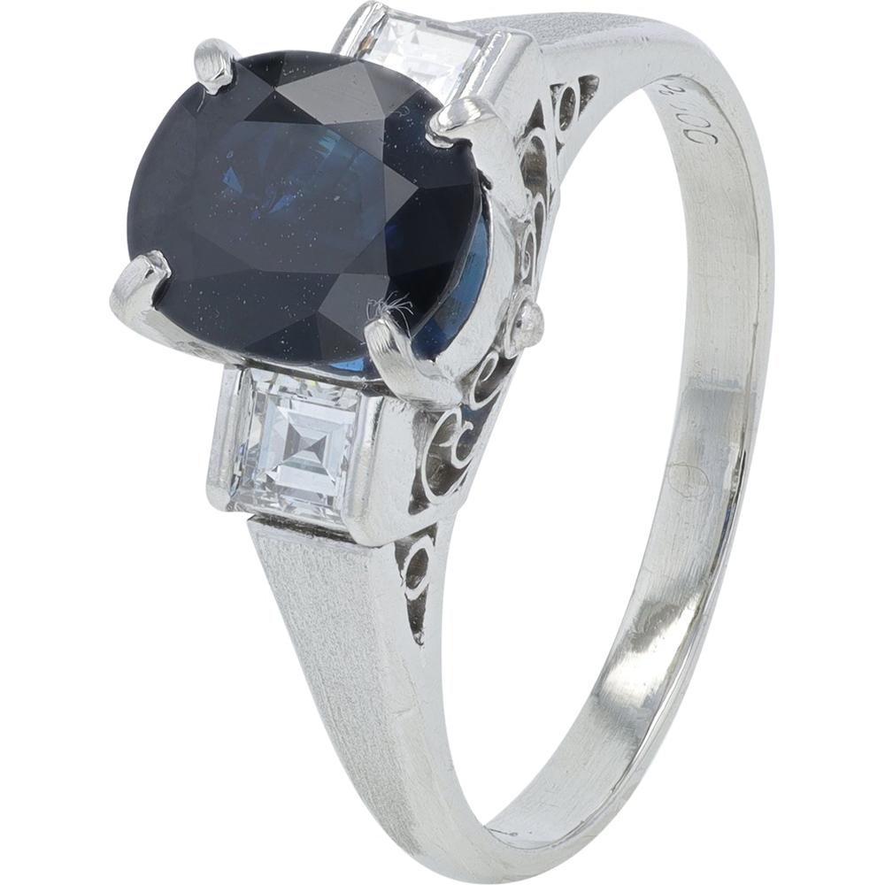 Platinum 1.93 Carat Total Weight Oval Sapphire Ring with 0.32 Carat Baguette Diamonds