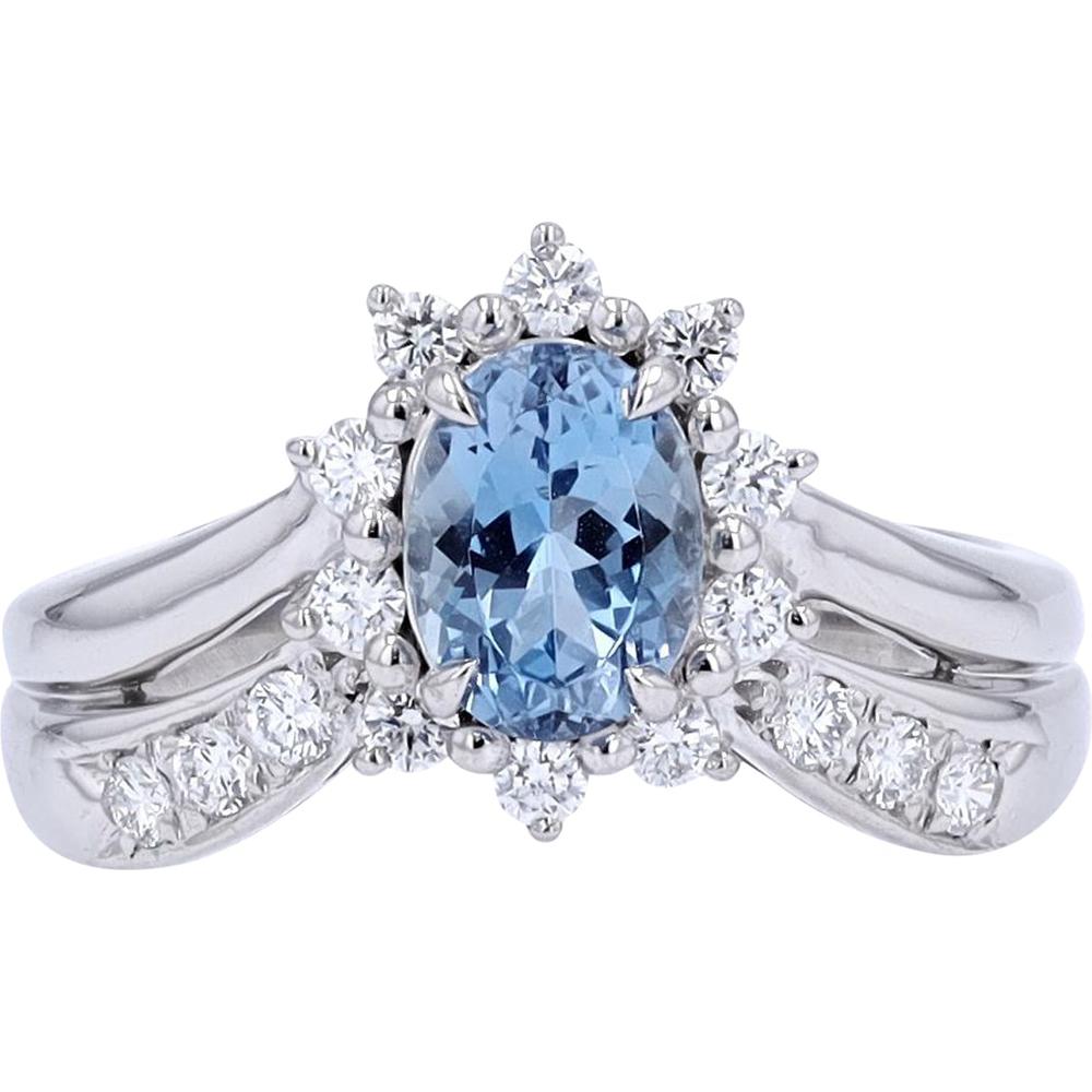 Platinum 1 Carat Oval Aquamarine Chevron Ring with 0.43 Carat Round Diamond Accents