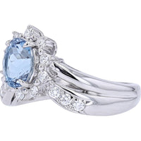 Platinum 1 Carat Oval Aquamarine Chevron Ring with 0.43 Carat Round Diamond Accents
