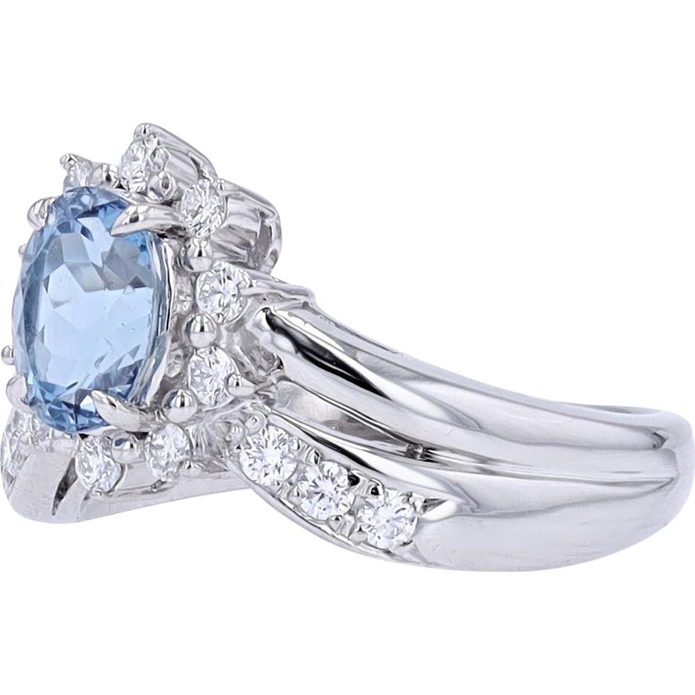 Platinum 1 Carat Oval Aquamarine Chevron Ring with 0.43 Carat Round Diamond Accents