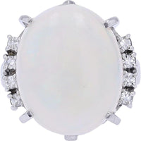 Platinum 10.16 Carat Oval Opal Ring with 0.16 Carat Diamond Accents