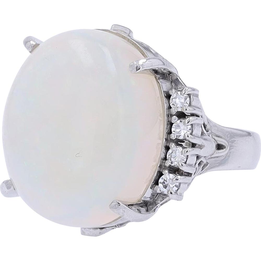 Platinum 10.16 Carat Oval Opal Ring with 0.16 Carat Diamond Accents