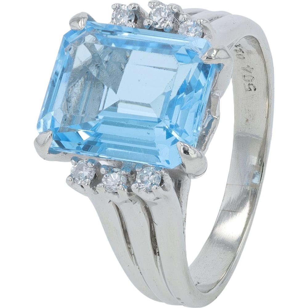 Platinum 16.03 Carat Emerald - Cut Blue Topaz Ring with 0.12 Carat Accent Diamonds
