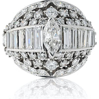 Platinum 1970's Bombe Ring with 5.75 Carats Marquise, Baguette, and Round Cut Diamonds