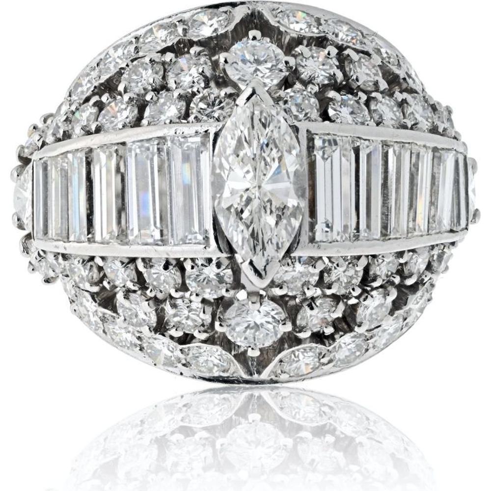 Platinum 1970's Bombe Ring with 5.75 Carats Marquise, Baguette, and Round Cut Diamonds