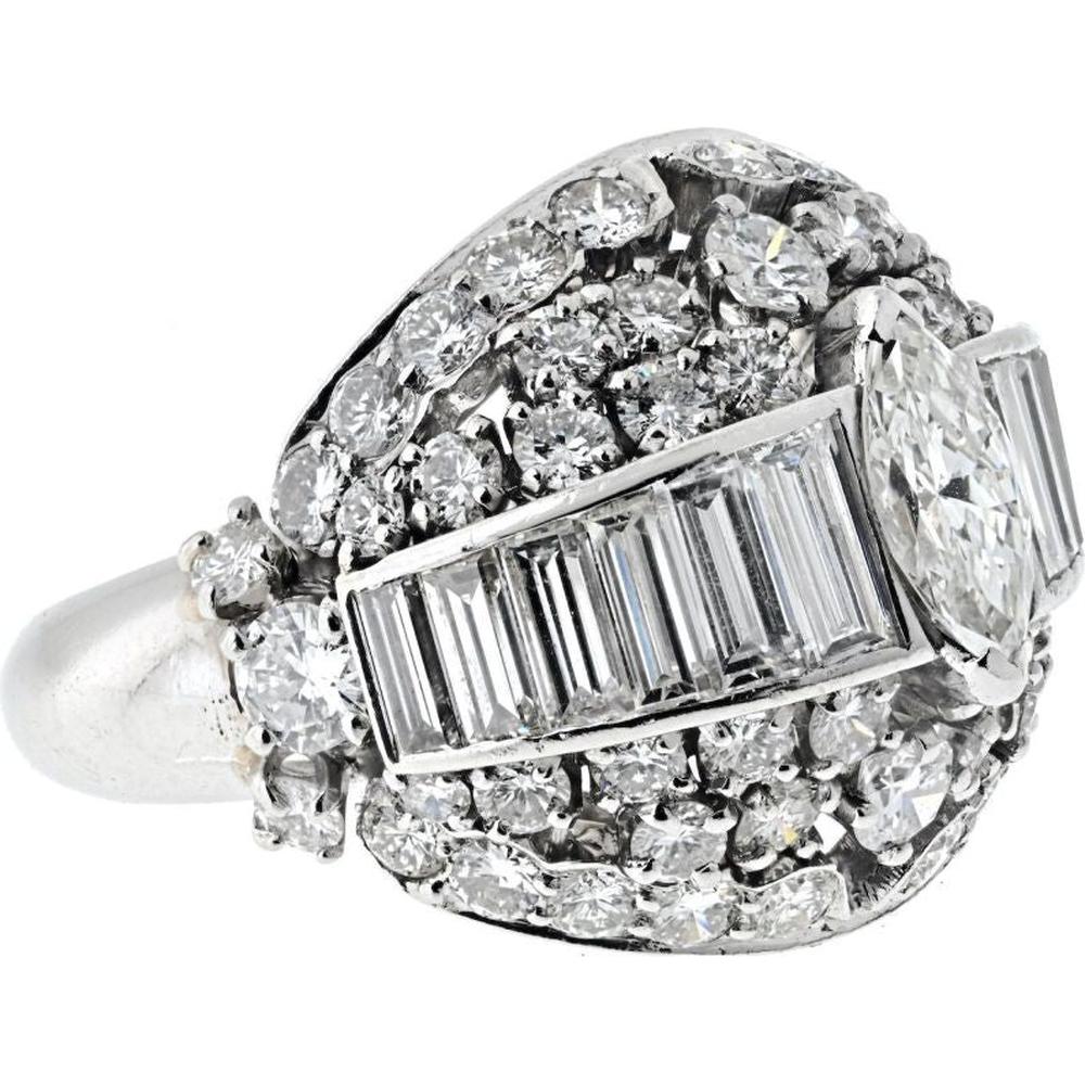 Platinum 1970's Bombe Ring with 5.75 Carats Marquise, Baguette, and Round Cut Diamonds