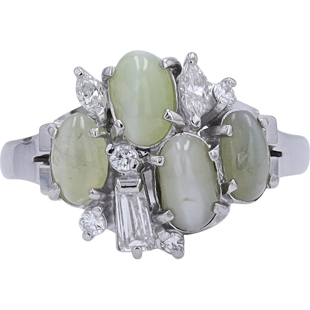 Platinum 2.40 Carat Chrysoberyl Four Stone Ring with 0.34 Carat Diamond Accents