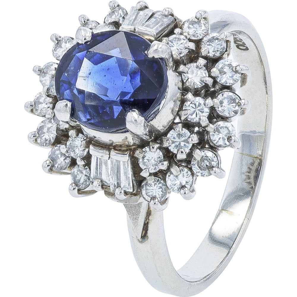 Platinum 2.67 Carat Oval Sapphire Halo Ring with Round and Baguette Diamond Accents - 0.68 Carat Total Diamond Weight