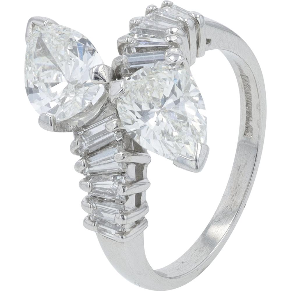 Platinum 3.25 Carat Total Diamond Bypass Ring with 2 Pear Cut and Tapered Baguette Diamonds