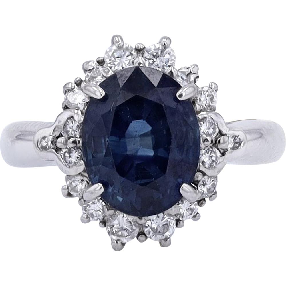 Platinum 3.96 Carat Oval Sapphire Ring with 0.33 Carat Halo Diamonds - GIA Certified