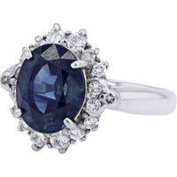 Platinum 3.96 Carat Oval Sapphire Ring with 0.33 Carat Halo Diamonds - GIA Certified