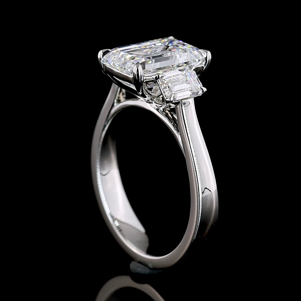 Platinum 3 Stone Ring with 3.01 Carat Emerald Cut Lab Diamond and 0.84 Carat Trapezoid Lab Diamonds - 3.85 Carat Total Weight - Covaloro Fine Jewelry