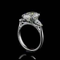 Platinum 3-Stone Ring with 3.50 Carats Oval Cut Lab Diamond and Pear Shape Side Stones - 4.24 Carats Total Diamond Weight - Covaloro Fine Jewelry