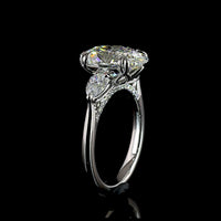 Platinum 3-Stone Ring with 3.50 Carats Oval Cut Lab Diamond and Pear Shape Side Stones - 4.24 Carats Total Diamond Weight - Covaloro Fine Jewelry