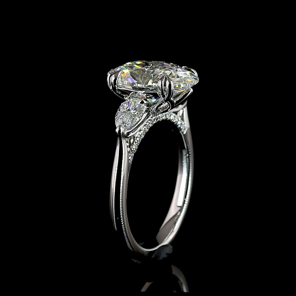 Platinum 3-Stone Ring with 3.50 Carats Oval Cut Lab Diamond and Pear Shape Side Stones - 4.24 Carats Total Diamond Weight - Covaloro Fine Jewelry