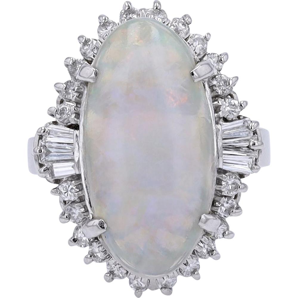 Platinum 4.50 Carat Oval Opal Ring with 0.62 Carat Diamond Halo