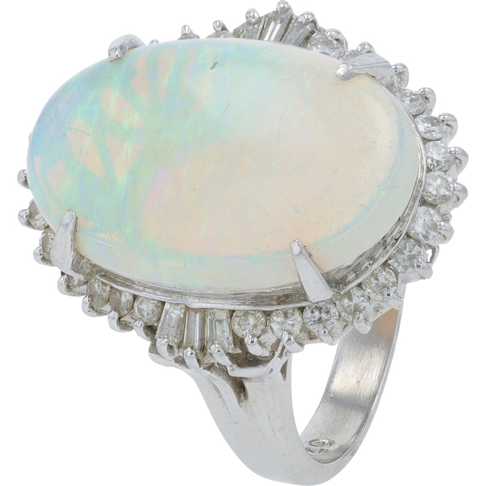 Platinum 4.53 Carat Oval Cabochon Opal Halo Ring with Round and Baguette Diamond Accents - 0.49 Carat Total Diamond Weight