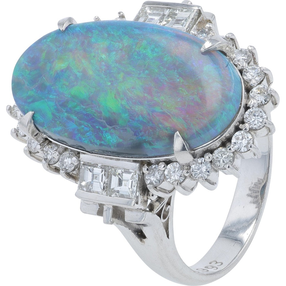 Platinum 6.59 Carat Oval Opal Cocktail Ring with Baguette and Round Diamond Accents - 0.993 Carat Total Diamond Weight
