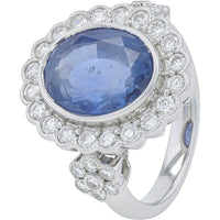 Platinum 7.03 Carat No Heat Oval Ceylon Sapphire Ring with Diamond Halo and Floral Shoulders - 0.93 Carat Total Diamond Weight