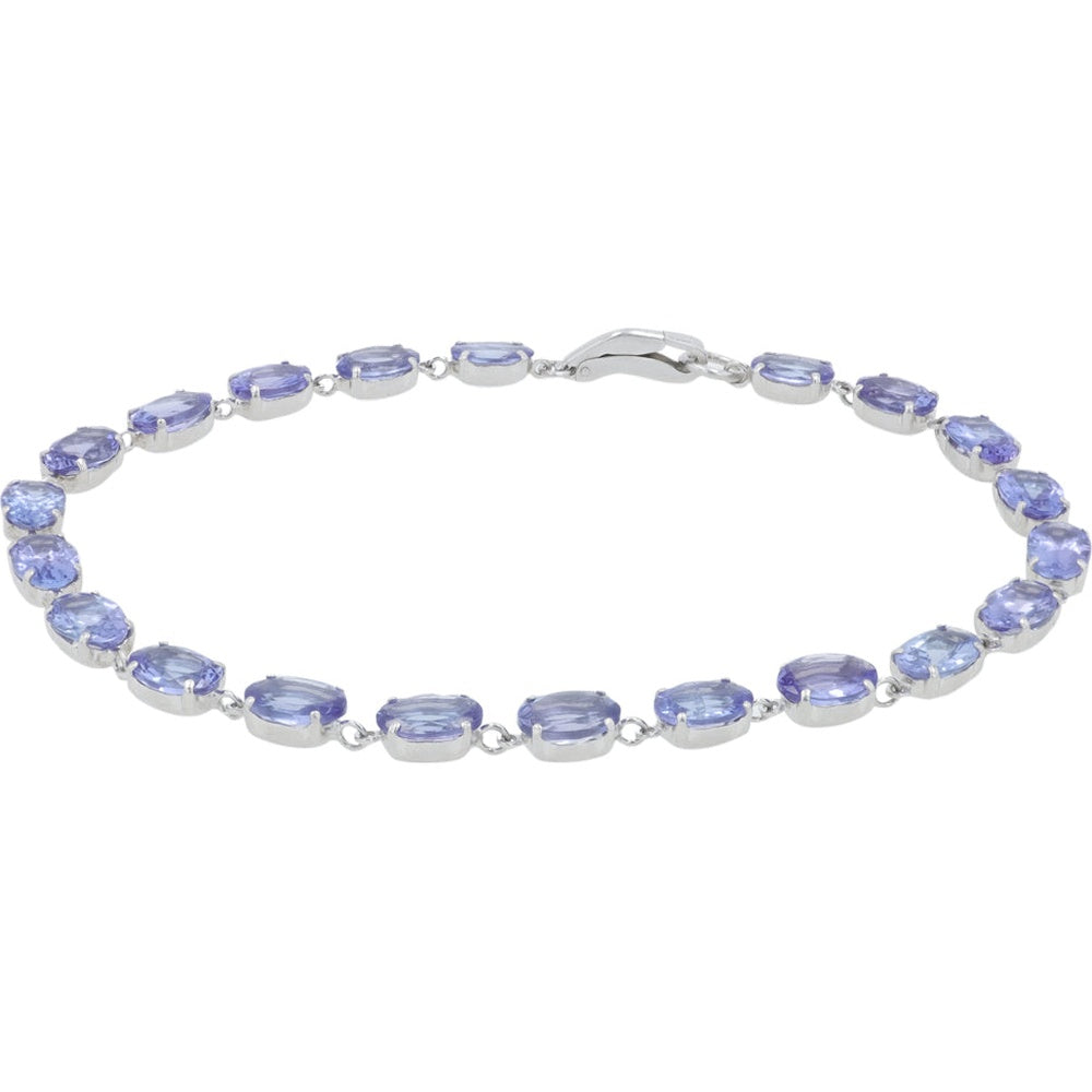 Platinum 7-Inch Station Bracelet with 4-Prong Set Oval Tanzanite Gemstones - 7.40 Carat Total Gem Weight