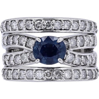 Platinum 900 Crossover Ring with 1.02 Carat Oval Sapphire and 1.10 Carat Round Diamond Accents