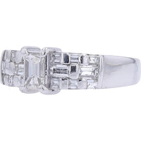 Platinum 900 Engagement Ring with 1.06 Carat Step-Cut Diamond Center and Baguette Accent Shoulders