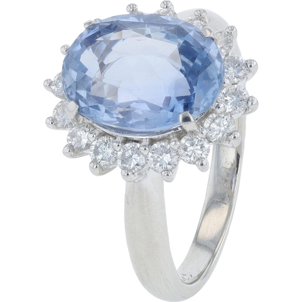 Platinum 900 Halo Ring with Oval Blue Sapphire and Round Diamond Accents - 4.29 Carat Sapphire and 0.62 Carat Total Diamond Weight
