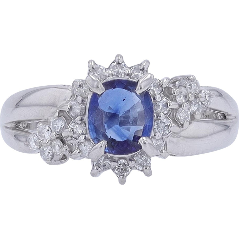 Platinum 900 Halo Ring with Oval-Cut Blue Sapphire and Starburst Diamond Accents - 0.83 Carat Sapphire and 0.31 Carat Total Diamond Weight