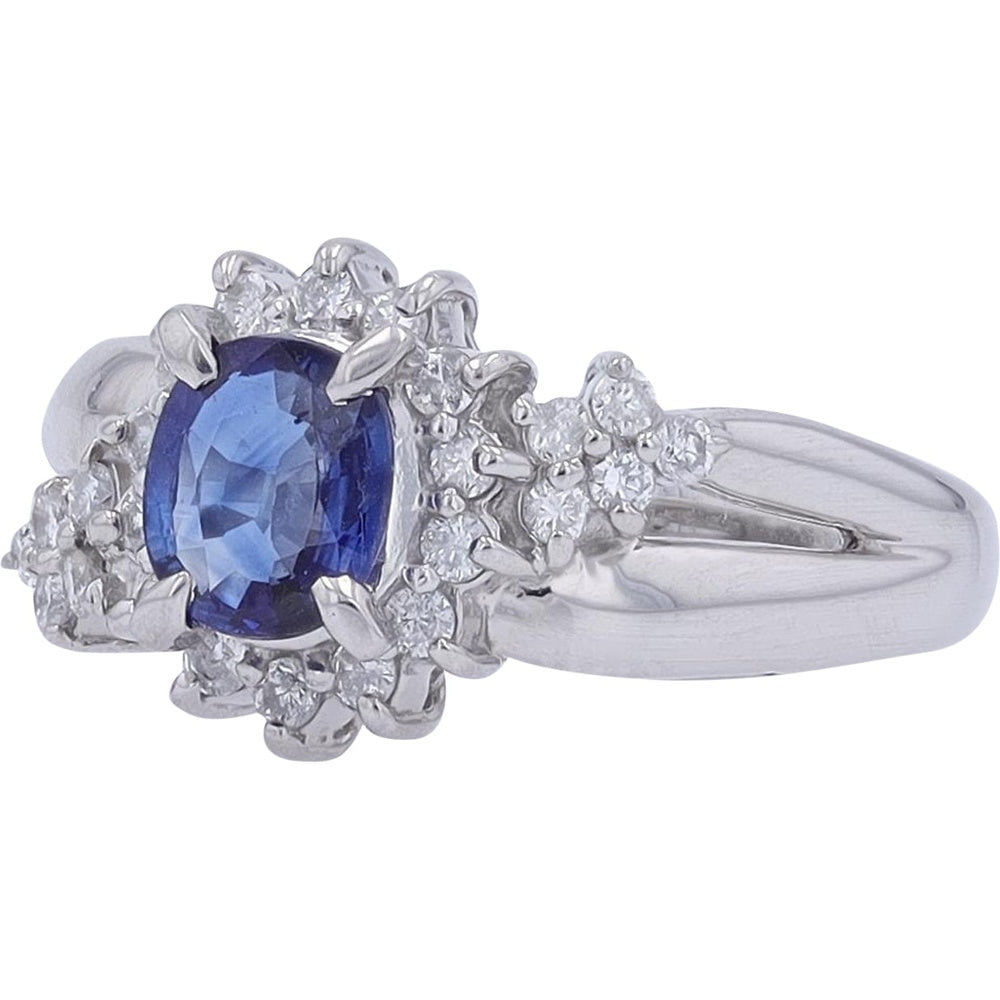 Platinum 900 Halo Ring with Oval-Cut Blue Sapphire and Starburst Diamond Accents - 0.83 Carat Sapphire and 0.31 Carat Total Diamond Weight