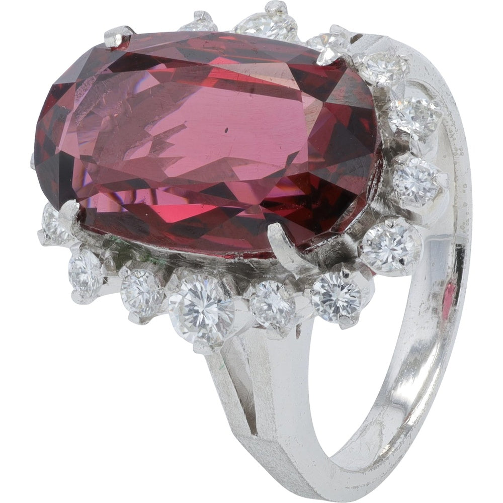 Platinum 900 Halo Ring with Oval Rhodolite Garnet and Round Diamonds - 9.02 Carat Garnet and 0.60 Carat Diamond Total Weight