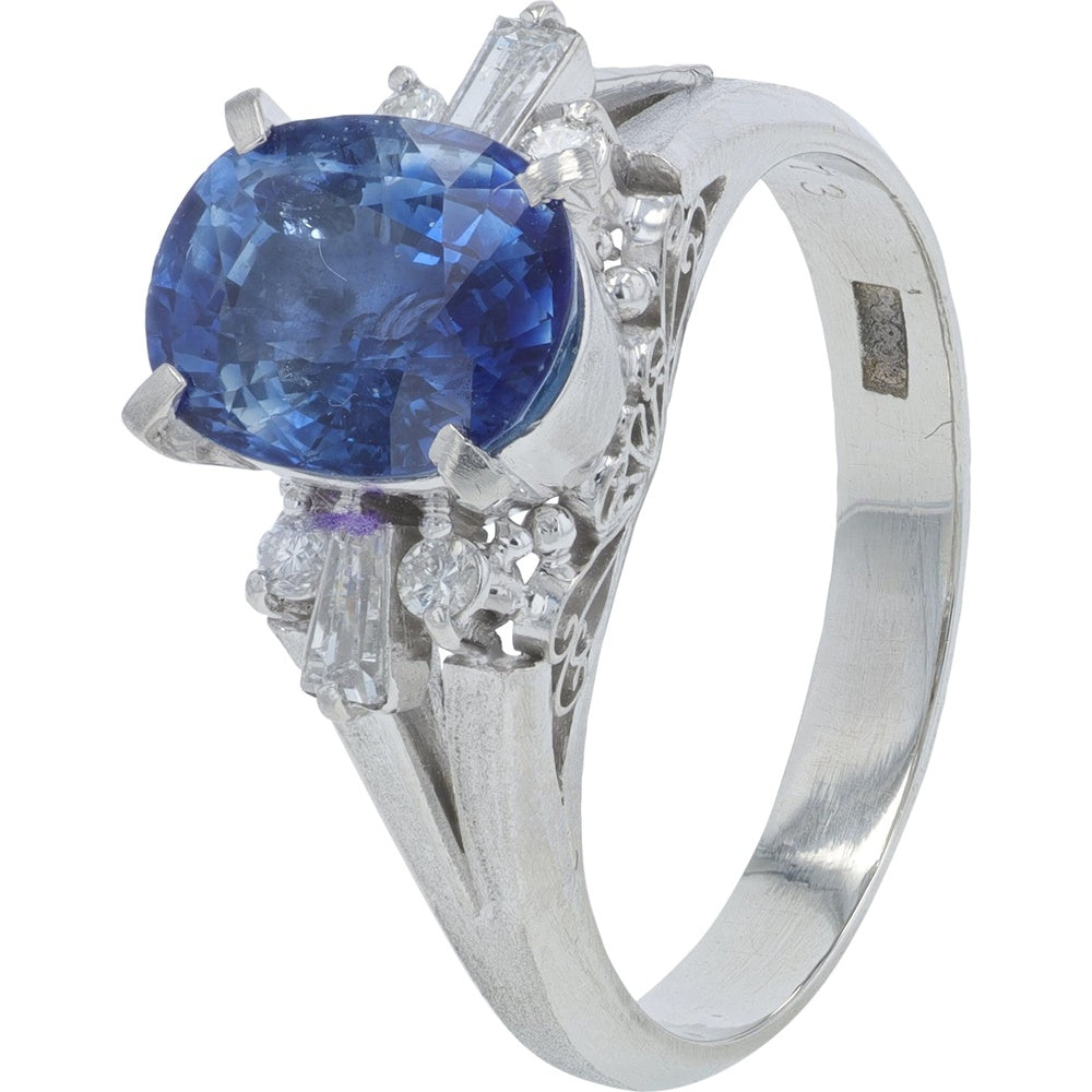 Platinum 900 Oval Cut Sapphire Ring with Baguette and Round Diamond Accents - 2.73 Carat Total Sapphire Weight and 0.23 Carat Total Diamond Weight