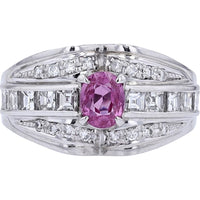 Platinum 900 Ring with 0.73 Carat Oval Cut Ruby and 0.77 Carat Baguette and Round Diamond Accents