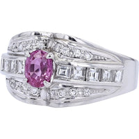 Platinum 900 Ring with 0.73 Carat Oval Cut Ruby and 0.77 Carat Baguette and Round Diamond Accents