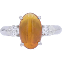 Platinum 900 Ring with 2.03 Carat Oval Opal and 0.54 Carat Pear Diamond Accents