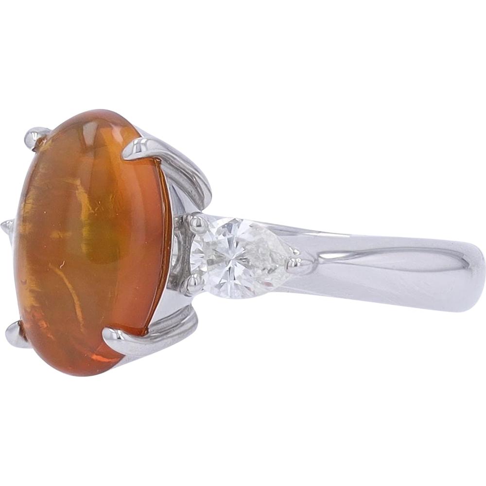 Platinum 900 Ring with 2.03 Carat Oval Opal and 0.54 Carat Pear Diamond Accents