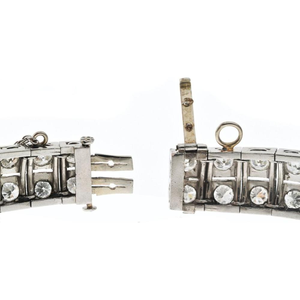 Platinum Art Deco Bracelet with 8.50 Carats Total Diamond Weight and Emerald Accents