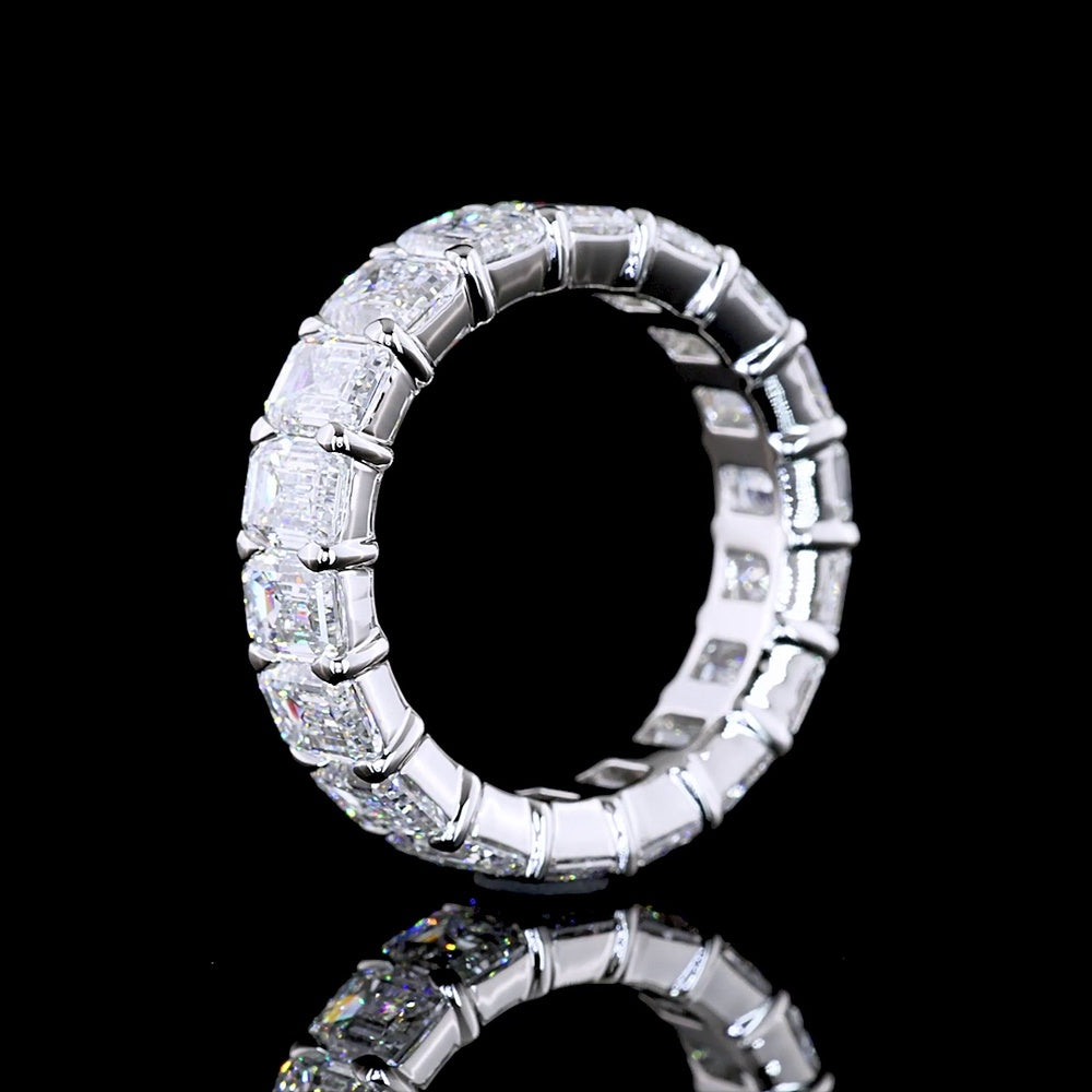 Platinum Eternity Band with 18 Emerald Cut Lab Diamonds in Prong Setting - 6.89 Carat Total Weight, E-F Color VS1 Clarity - Covaloro Fine Jewelry