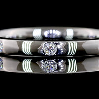 Platinum Eternity Band with 8 Flush Set Round Lab Diamonds - 0.13 Carat Total Diamond Weight - Covaloro Fine Jewelry