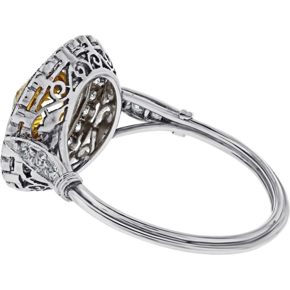 Platinum Fancy Yellow Diamond Double Halo Ring - 1.05 Carats Total Diamond Weight