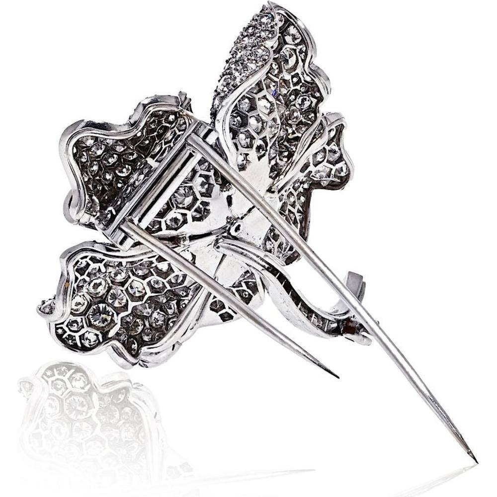 Platinum Flower Brooch with 17.00 Carats Round & Baguette Diamonds